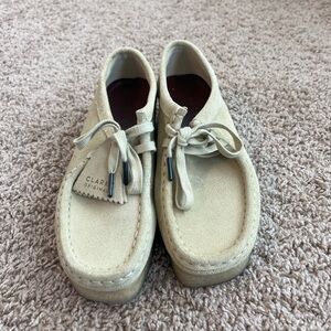 Clark’s tan suede wallabees